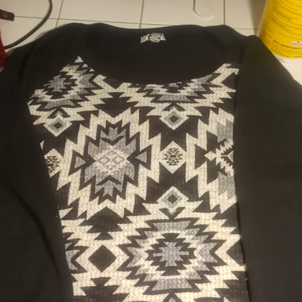 A black long sleeve Isolashirt
